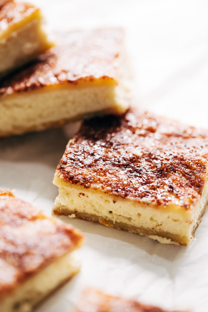 The Most Addicting Sopapilla Cheesecake Bars made with just 8 simple ingredients! These bars don't use the crescent roll dough! #sopapillacheesecakebars #cheesecake #cheesecakebars #snickerdoodle | Littlespicejar.com 