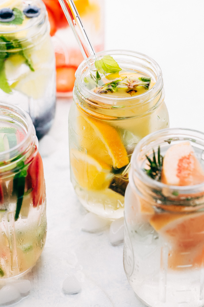 5 Infused Waters to Sip on This Summer - 5 recipes for infused water that you can enjoy all summer long! A great alternative to carbonated beverages and it's prettier to look at too! #infusedwater #water #infusedwaterrecipe | Littlespicejar.com