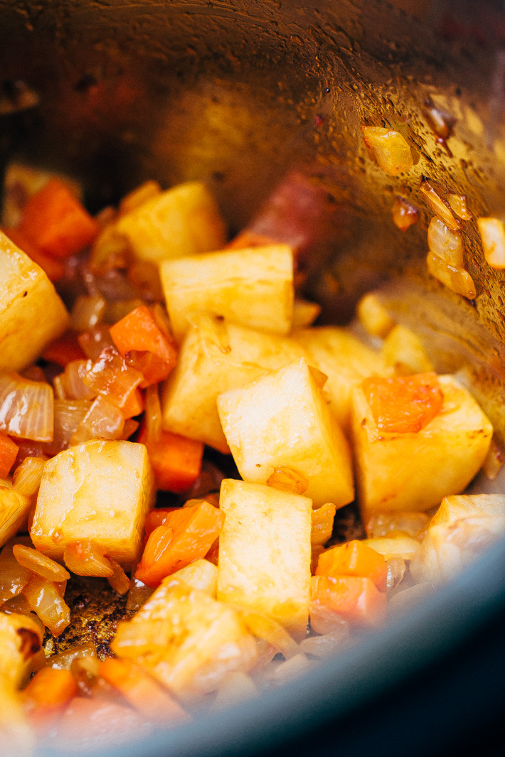 sautéed onions carrots and potatoes in instant pot for lentil soup