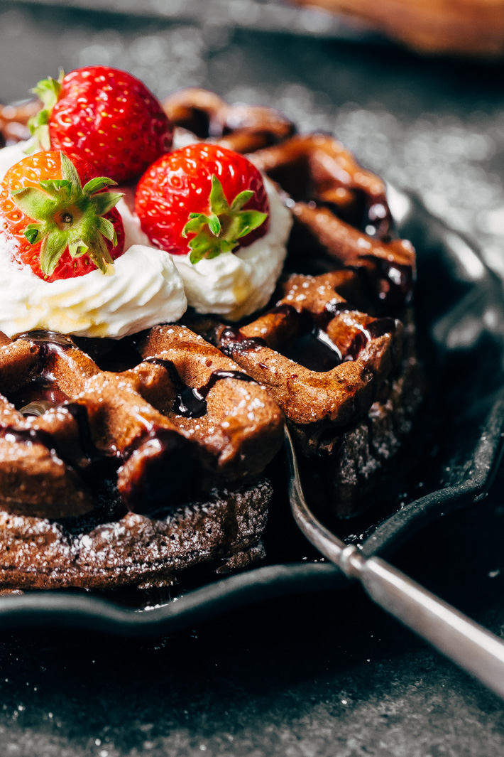 Bomb-Diggity Chocolate Waffles - These waffles are tender on the inside and crispy on the outside. Lightly sweetened so you can have them for breakfast or add a scoop on ice cream and turn them into waffle ice cream sandwiches! #browniewaffles #cakewaffles #chocolatewaffles #chocolatecakewaffles | Littlespicejar.com
