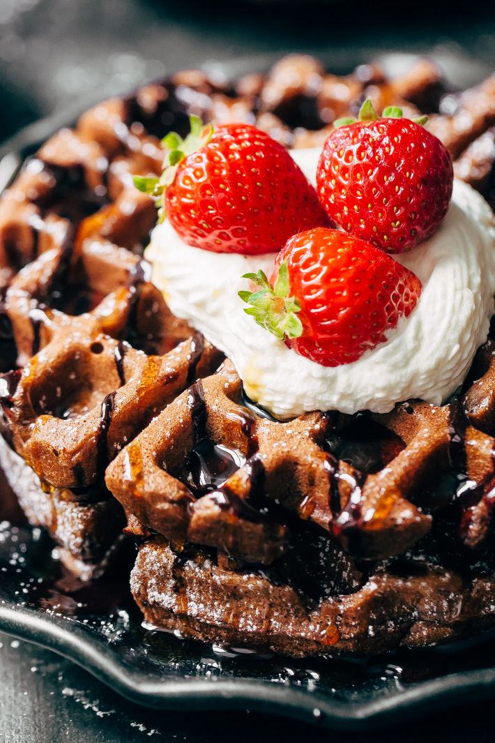 Bomb-Diggity Chocolate Waffles - These waffles are tender on the inside and crispy on the outside. Lightly sweetened so you can have them for breakfast or add a scoop on ice cream and turn them into waffle ice cream sandwiches! #browniewaffles #cakewaffles #chocolatewaffles #chocolatecakewaffles | Littlespicejar.com