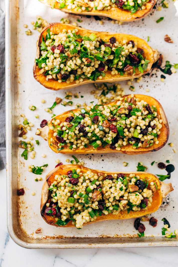 Stuffed Butternut Squash with Curried Couscous Salad - a simple side dish or main meal! Perfect for Thanksgiving. #stuffedbutternutsquash #butternutsquash #roastedbutternutsquash #couscoussalad | Littlespicejar.com