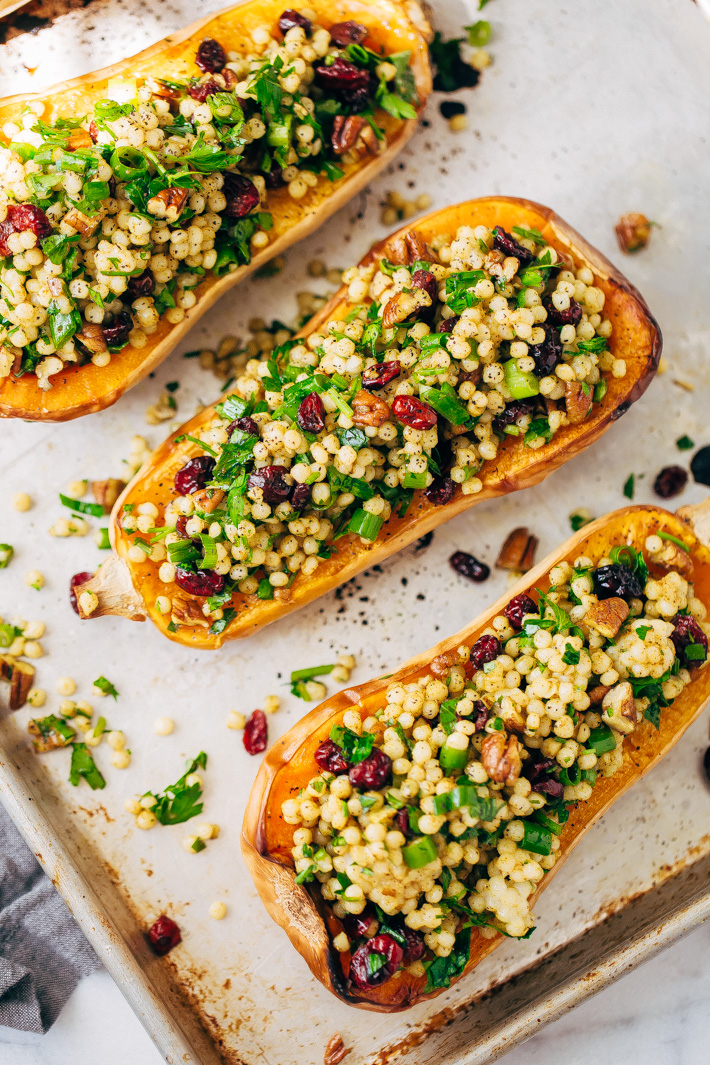 Stuffed Butternut Squash with Curried Couscous Salad - a simple side dish or main meal! Perfect for Thanksgiving. #stuffedbutternutsquash #butternutsquash #roastedbutternutsquash #couscoussalad | Littlespicejar.com