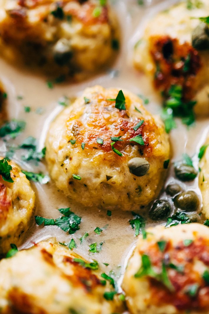 piccata meatballs with parsley and capers in sauce