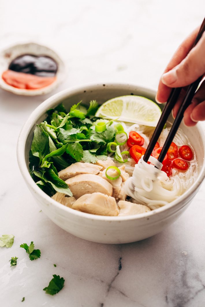Instant Pot Chicken Pho Noodle Soup (Pho Ga) - Learn how to make chicken pho in your instant pot! This soup has tons of aromatics and is delicious! #instantpot #pressurecooker #chickenpho #phoga #instantpotchickenpho | Littlespicejar.com