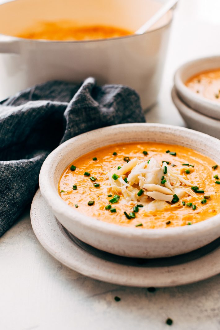 Blushing Tomato Crab Bisque - made with roasted veggies and tons of fresh herbs and spices! This soup is perfect as a starter or main course! #easter #crabbisque #tomatocrabbisque #tomatobisque #crabchowder | Littlespicejar.com
