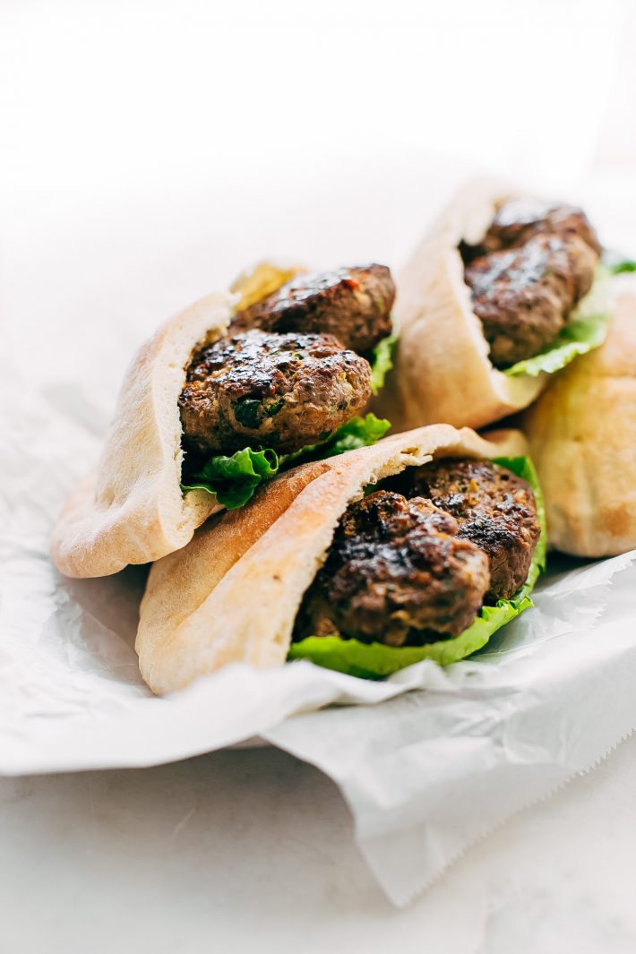 Kofta Pita Sandwiches - homemade kofta kabobs made with just a few ingredients and stuffed inside pocket pita bread! These are so good with my homemade garlic tahini sauce! #kofta #koftakabob #koftapitasandwich #naanwich | Littlespicejar.com