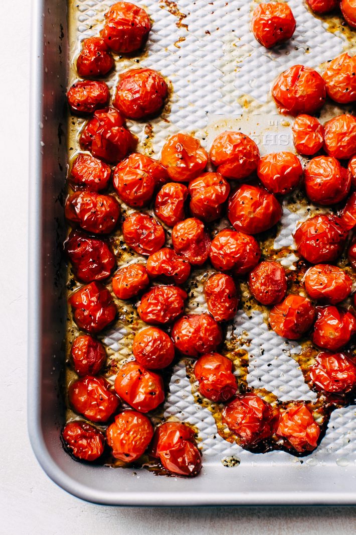 roasted tomatoes on baking sheet