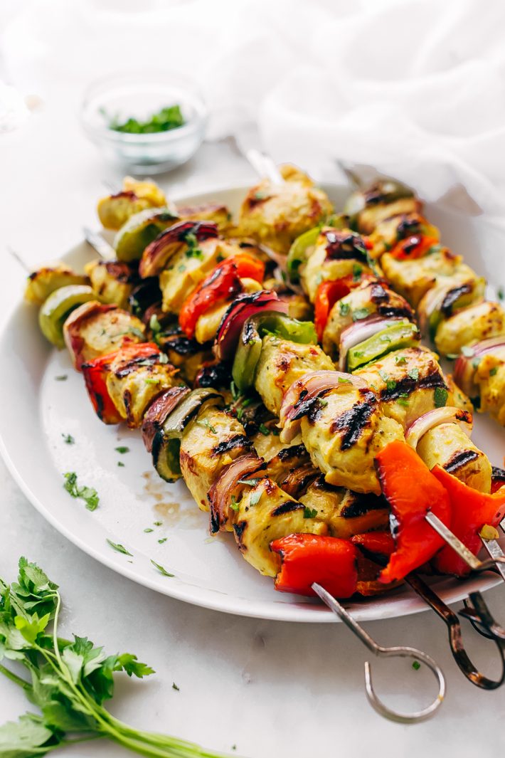 Easy Persian Chicken Kebabs - marinated in one secret ingredient that makes the chicken so tender it just melts in your mouth! #chickenkebabs #shishkebabs #persianchickenkebabs #jujehchicken | Littlespicejar.com