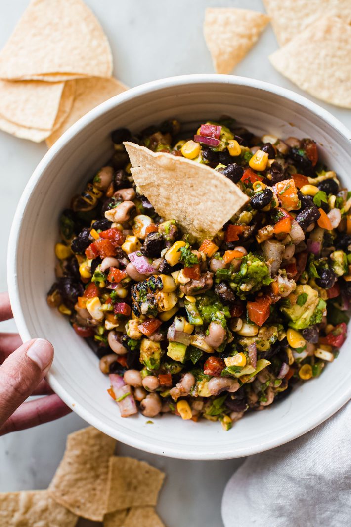 Texas Caviar in a bowl with tortilla chip