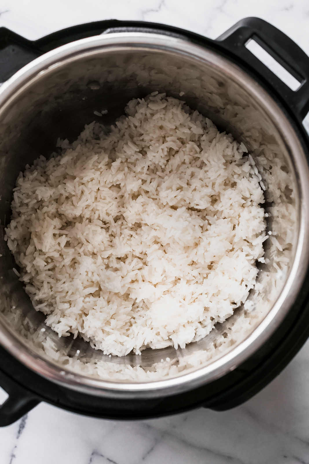 instant pot with fluffed coconut rice