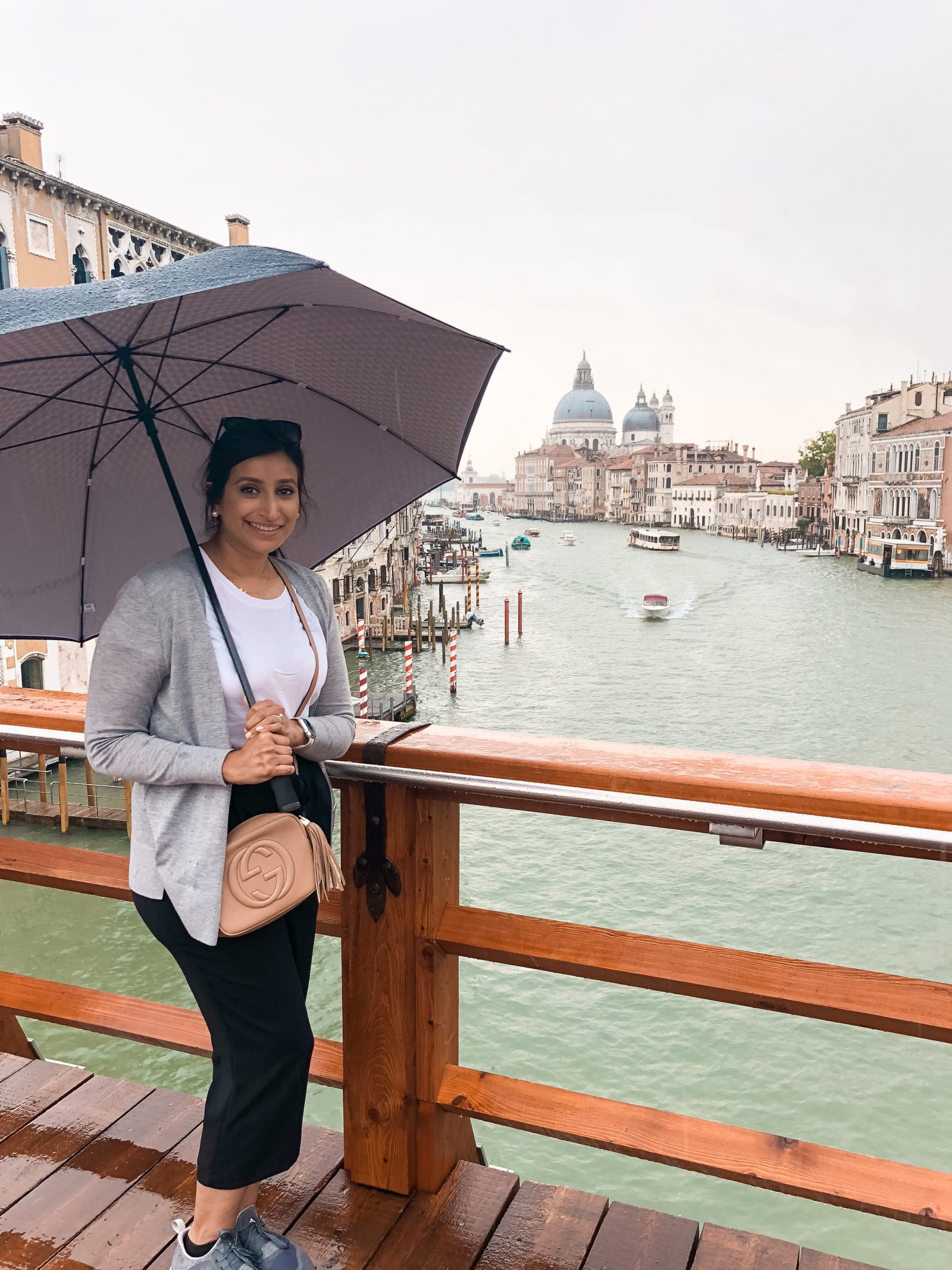 a picture of me with an umbrella with Gallerie dell'Accademia in the background