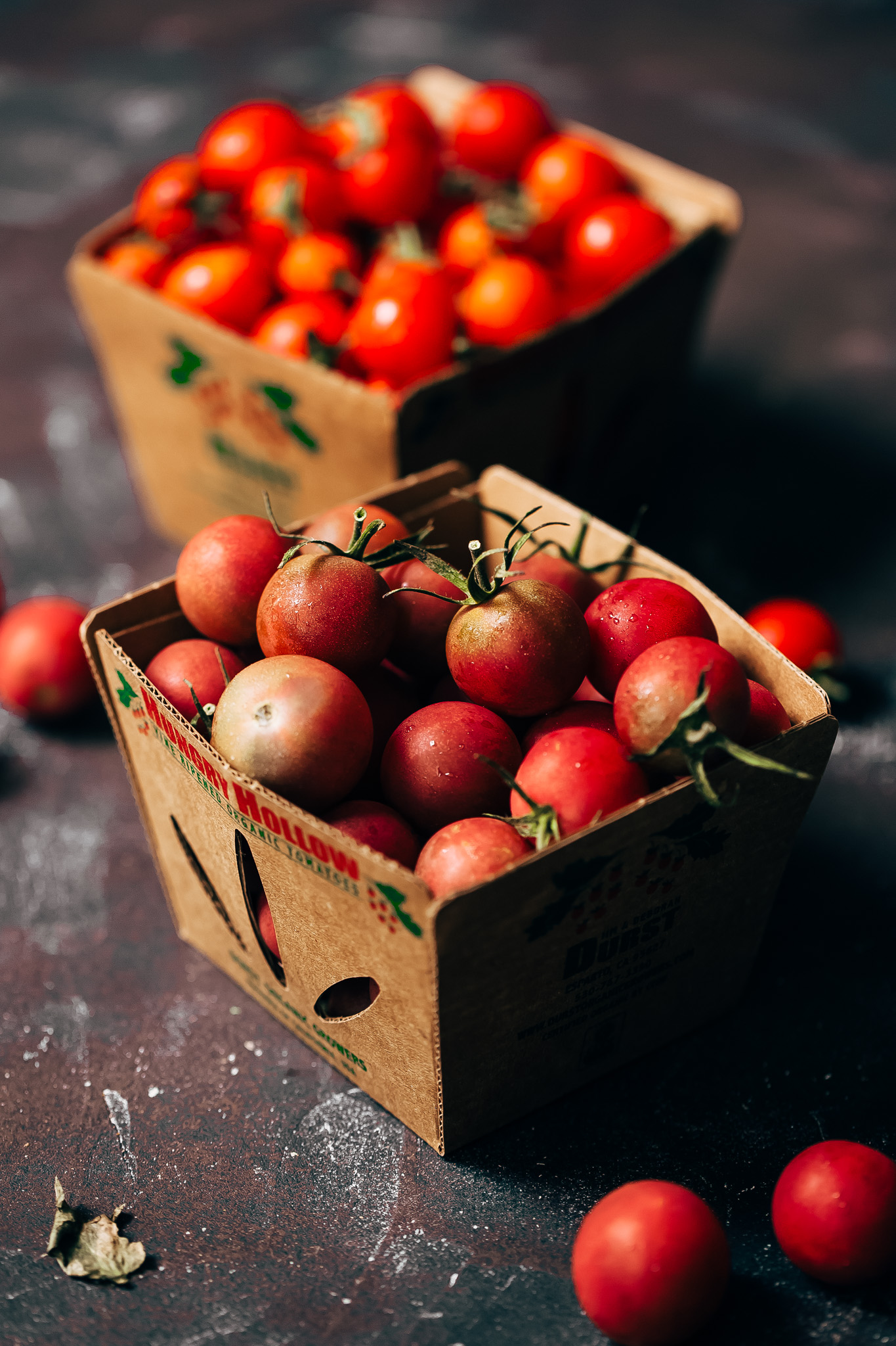 freshly cherry tomatoes in cardboard crate