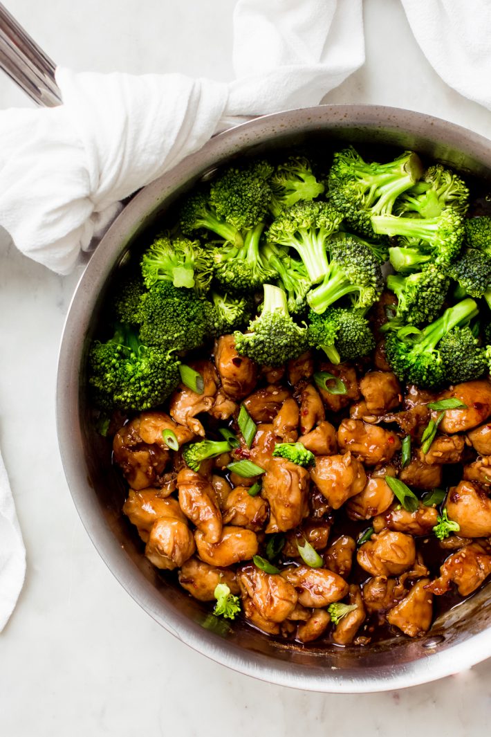 chicken teriyaki in a pan with broccoli