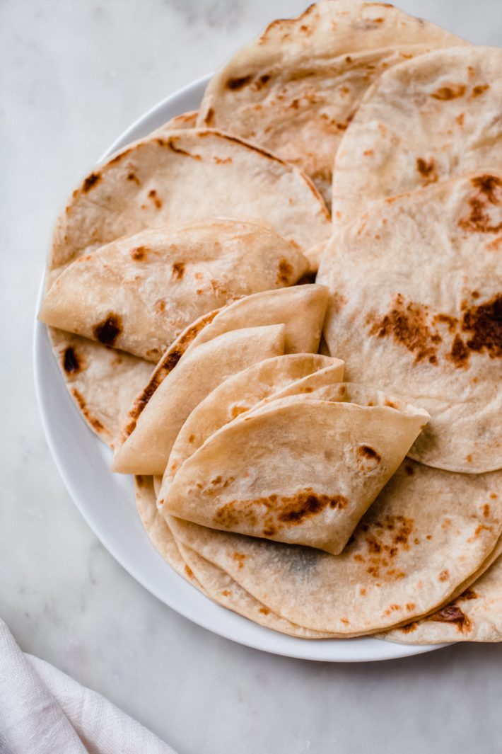 cooked and folded flour tortillas