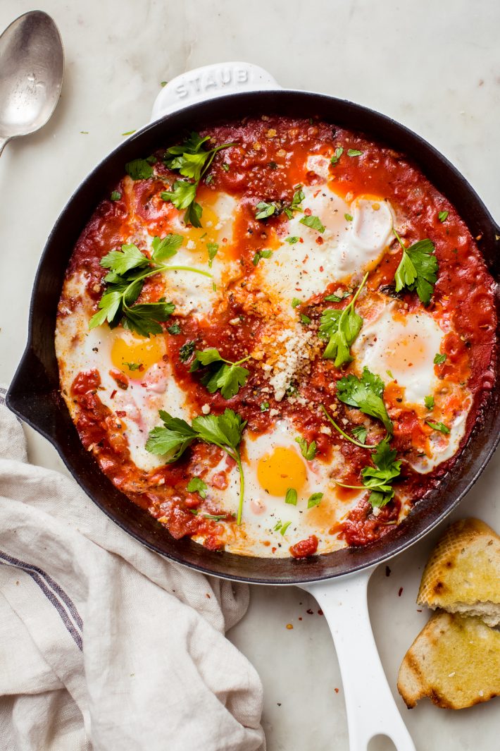 eggs in purgatory in a cast iron skillet