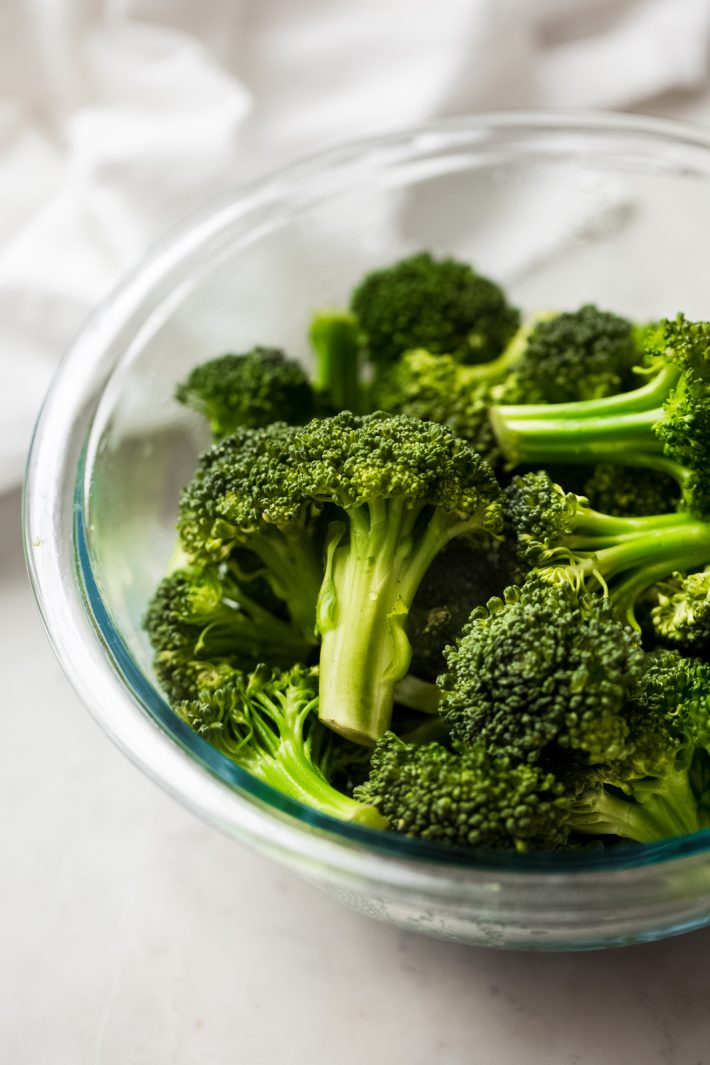 steamed broccoli in glass bowl