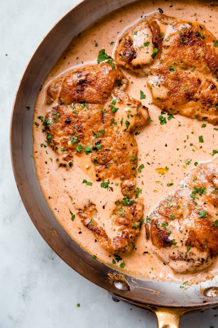 close up of pan-fried chicken filet with cream sauce
