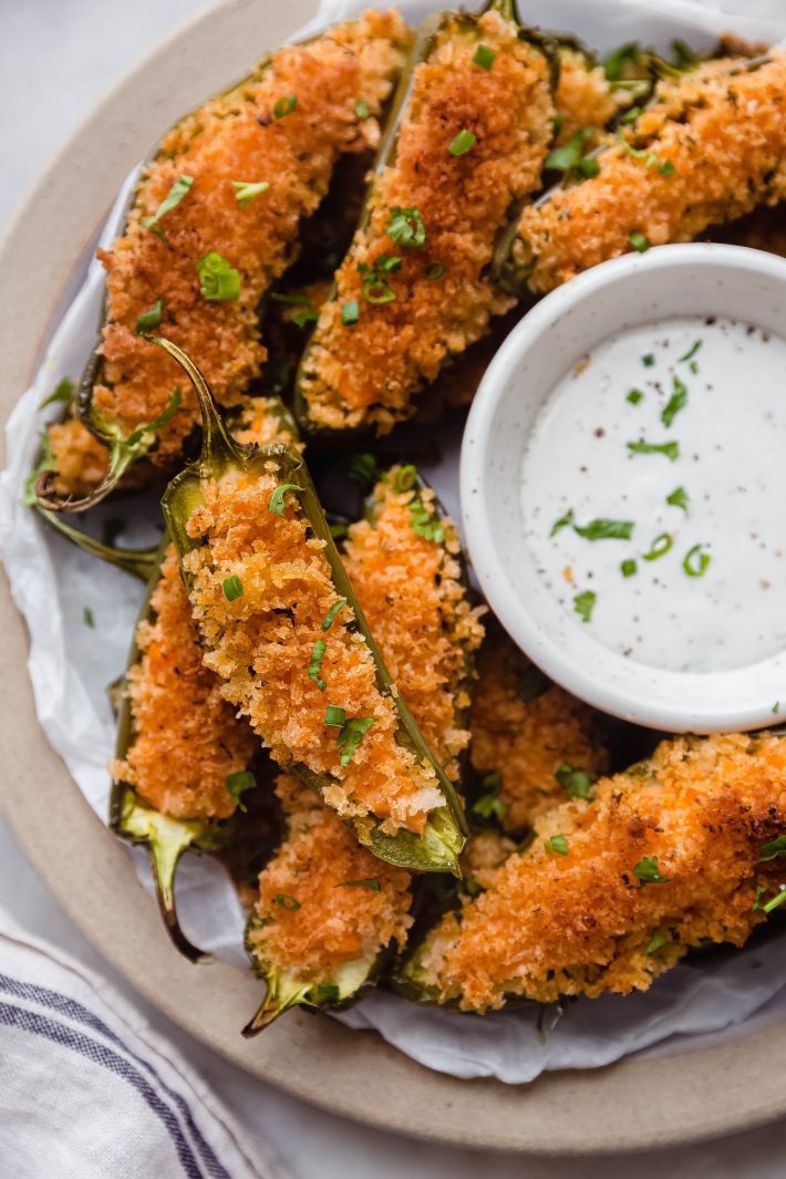 buffalo chicken jalapeno poppers on plate with ranch