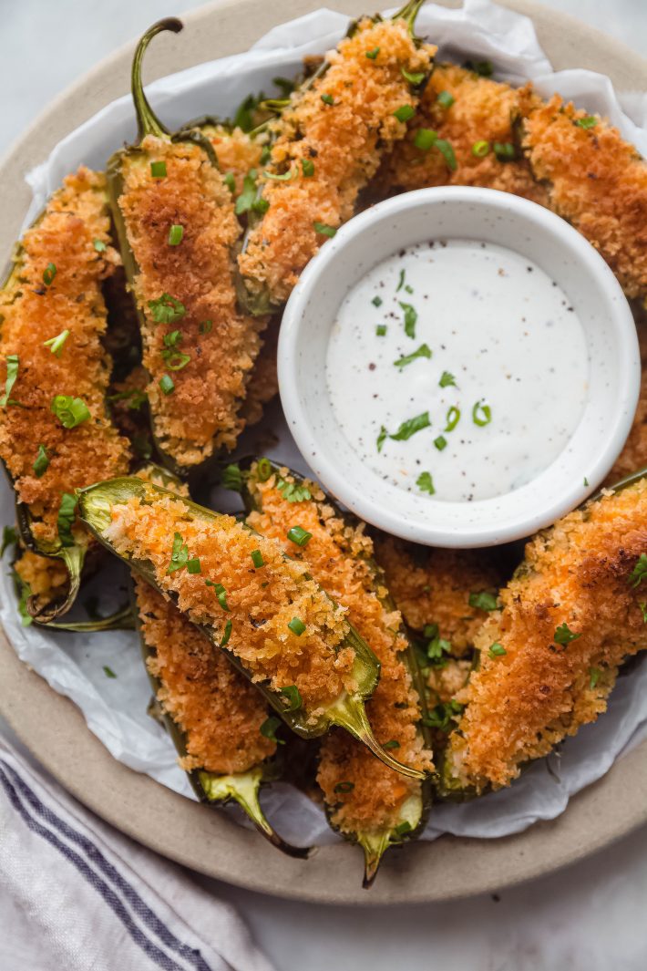 buffalo chicken jalapeno poppers on plate with ranch