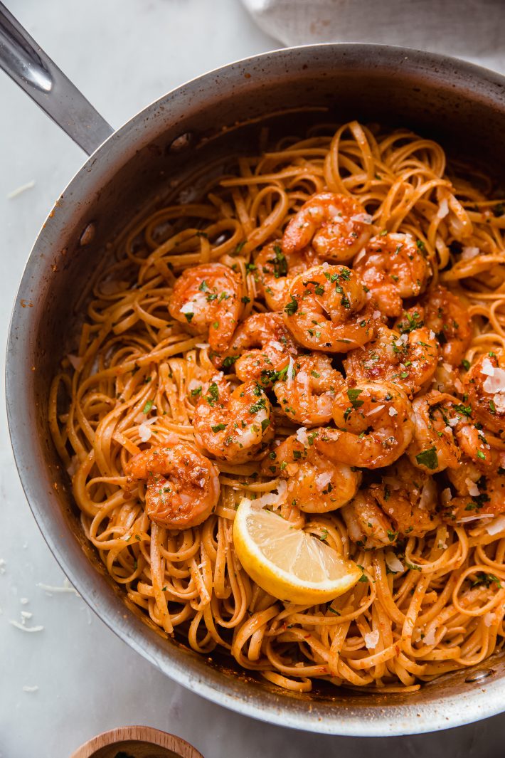 Calabrian chili pasta with shrimp in skillet