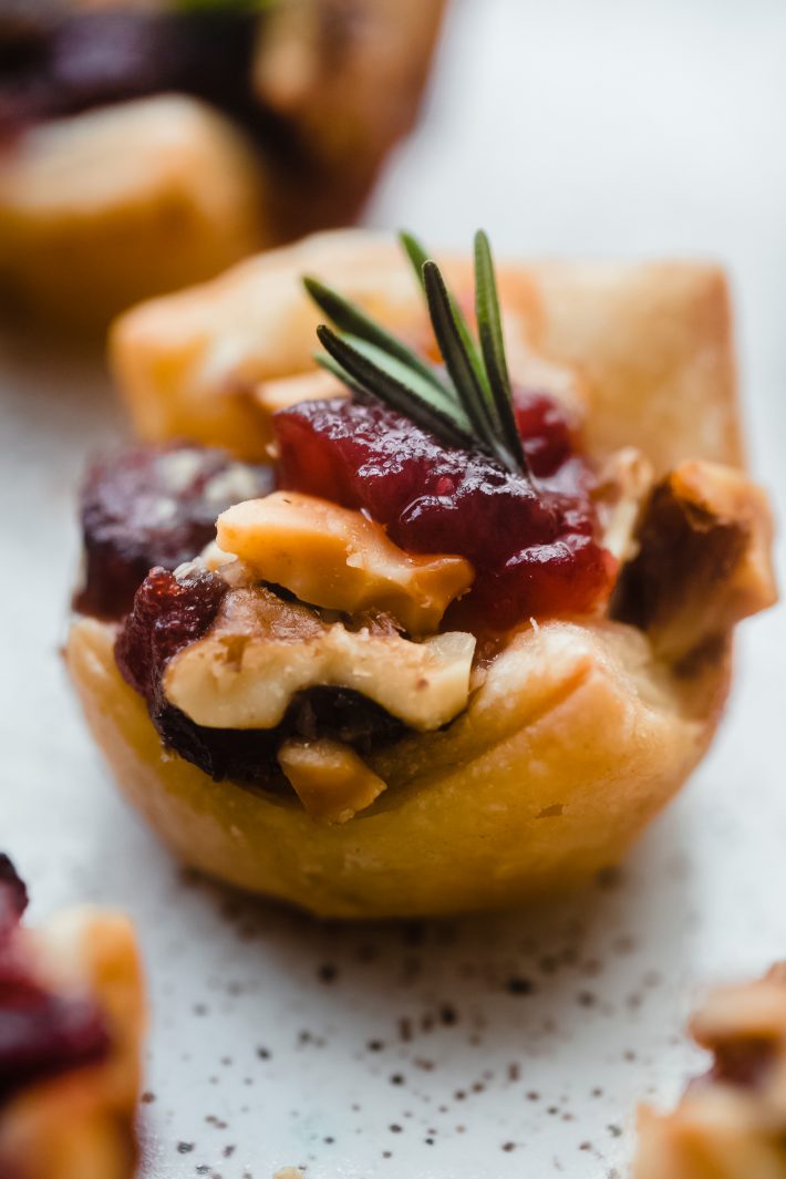 puff pastry with walnuts cranberry sauce and rosemary showing