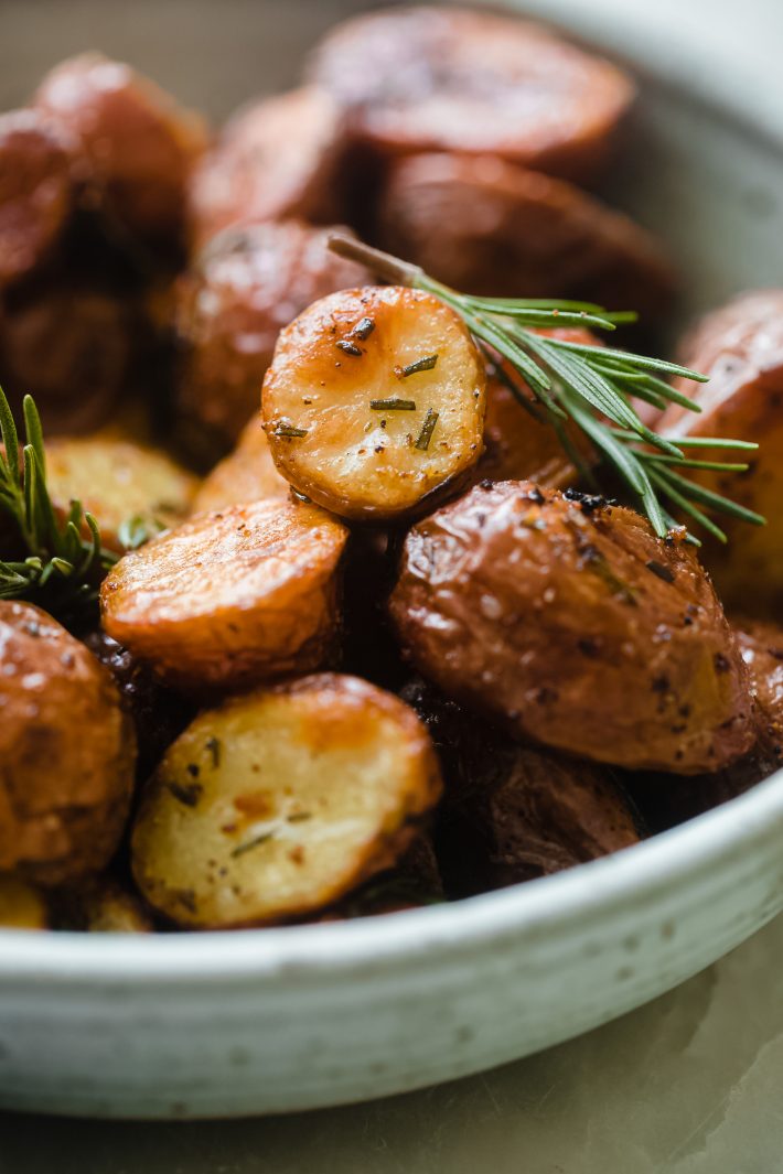 roasted potatoes with rosemary in bowl