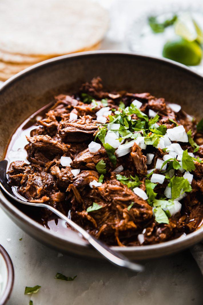 shreded beef in birria sauce