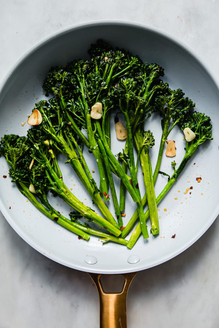 sautéed broccolini in pan