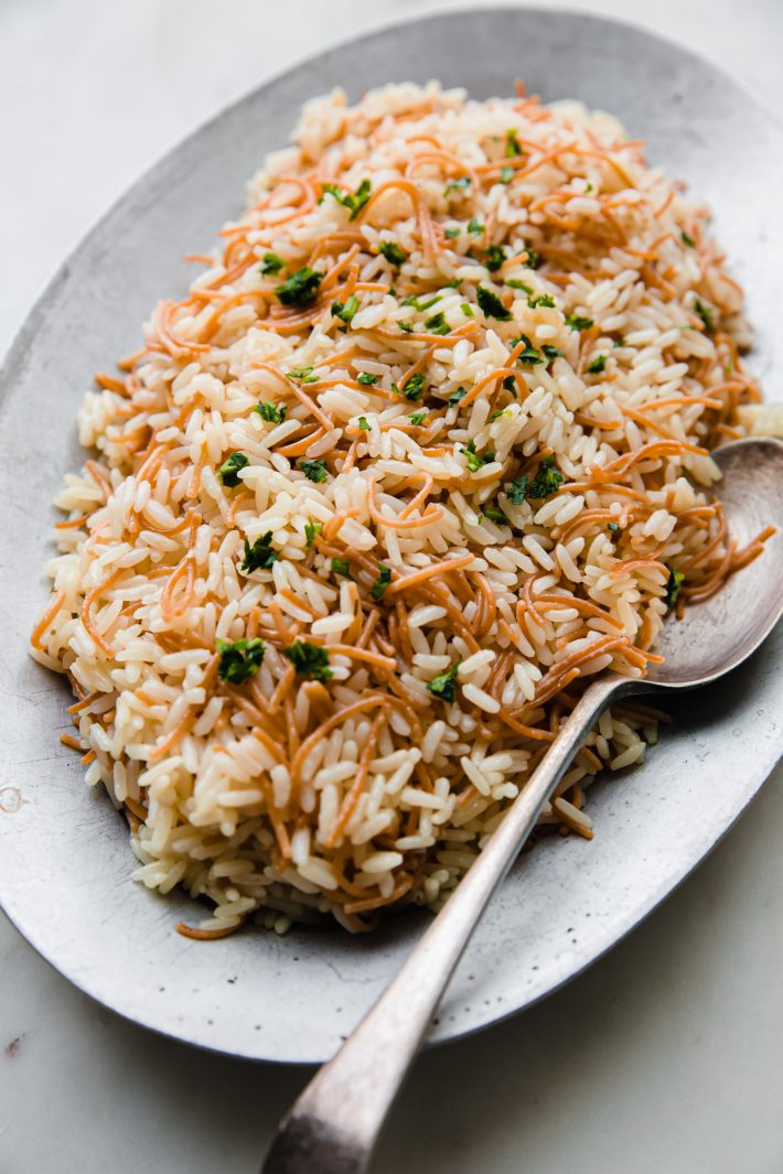 vermicelli rice on plate topped with parsley