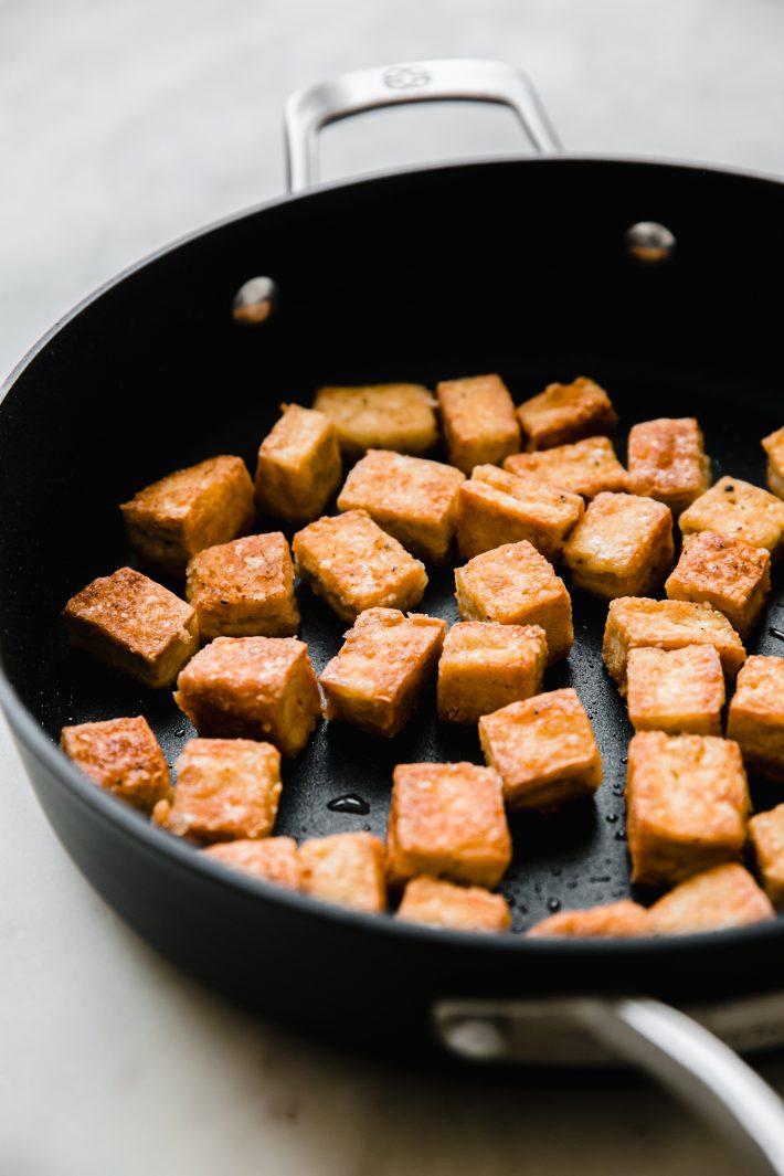 crispy tofu in nonstick pan