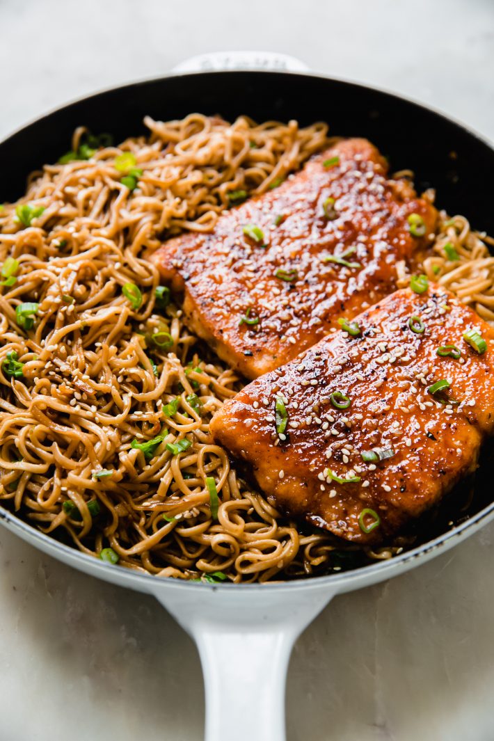 teriyaki salmon with ginger noodles in cast iron pan