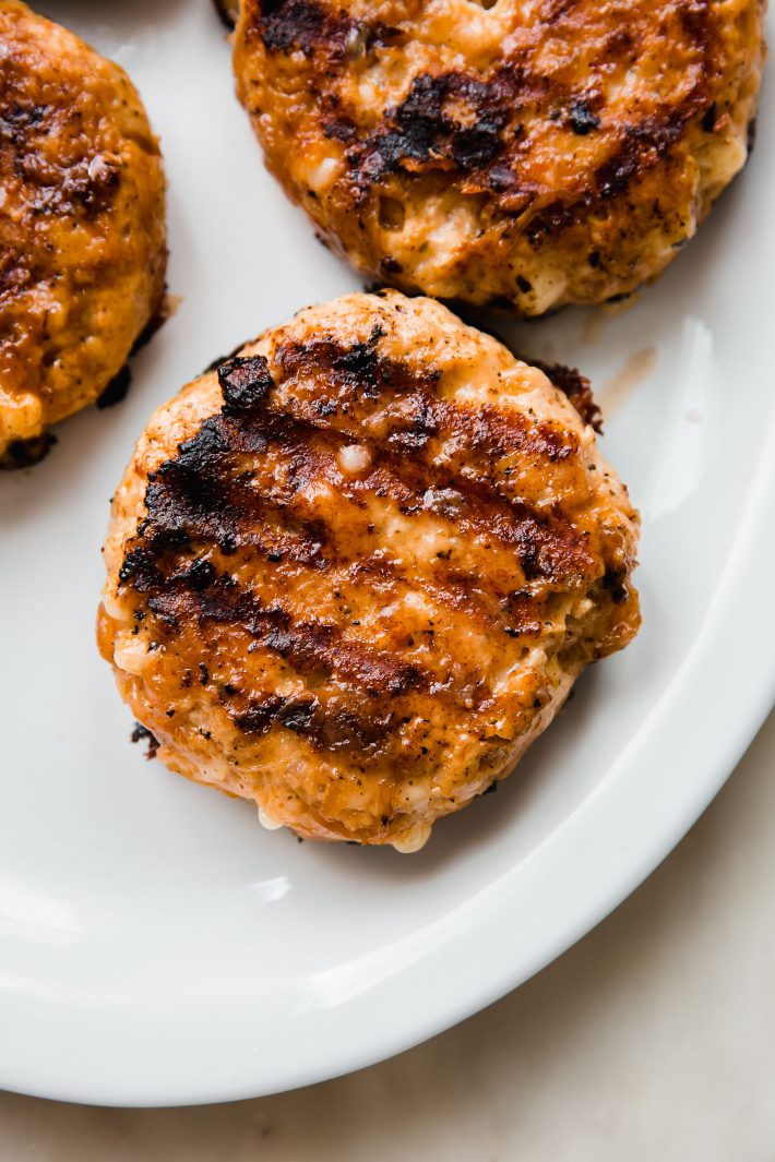 grilled chicken patty on white plate