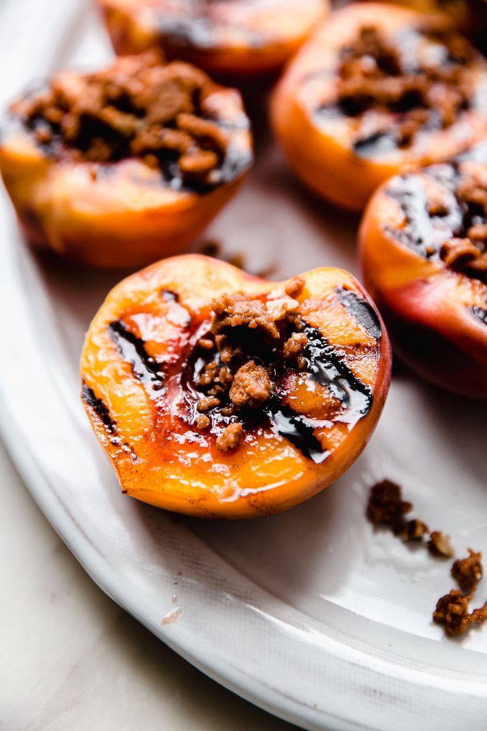 grilled peaches topped with cookie crumble