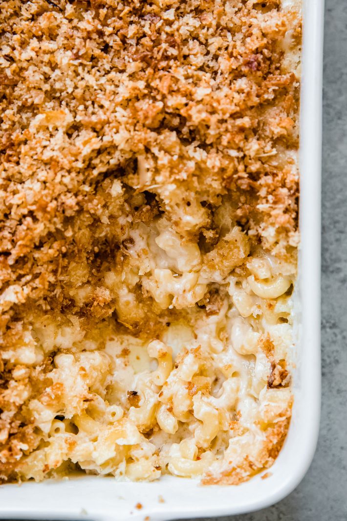 macaroni showing in cheese sauce with panko on top
