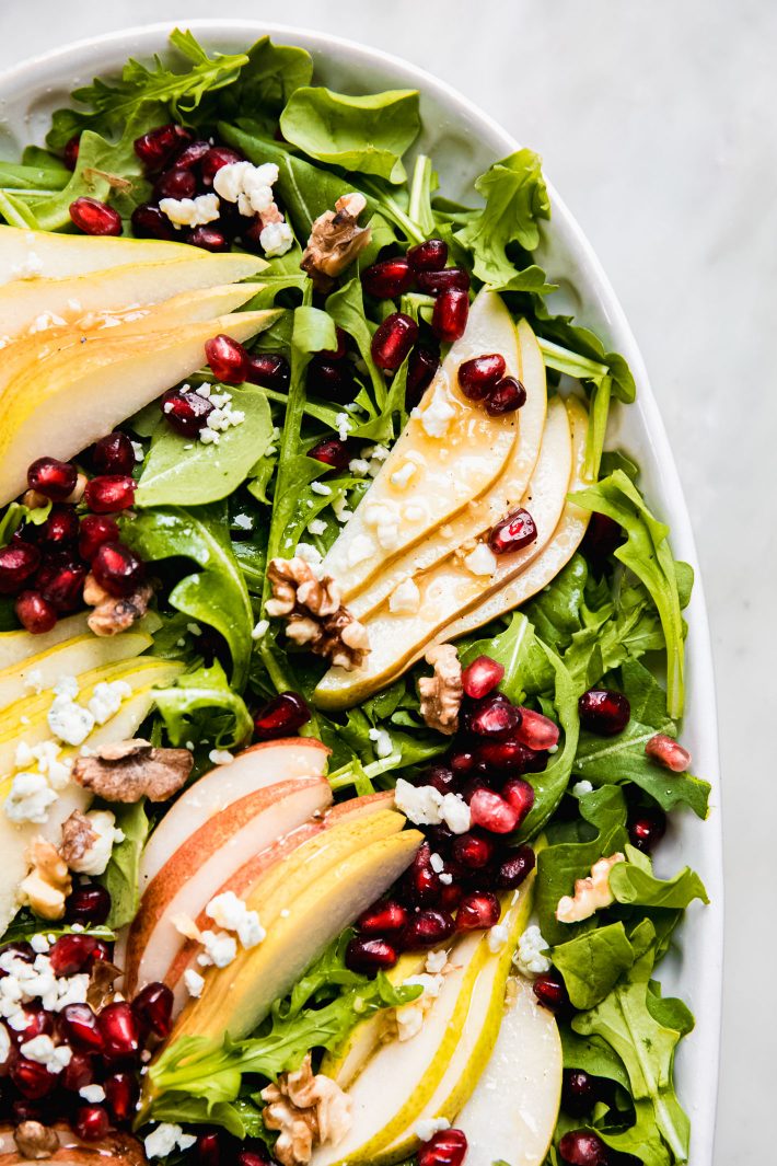 pear and walnut salad dressing in platter