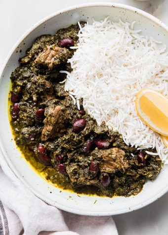 ghormeh sabzi on plate with lemon and basmati rice