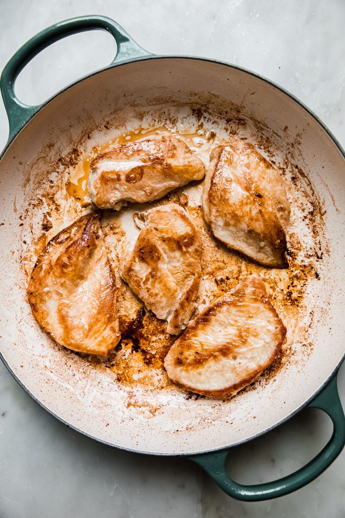 seared chicken breasts in skillet