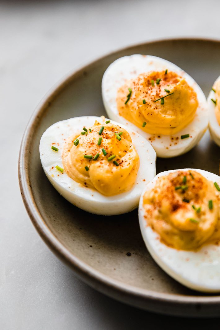 southern deviled eggs on plate with chives