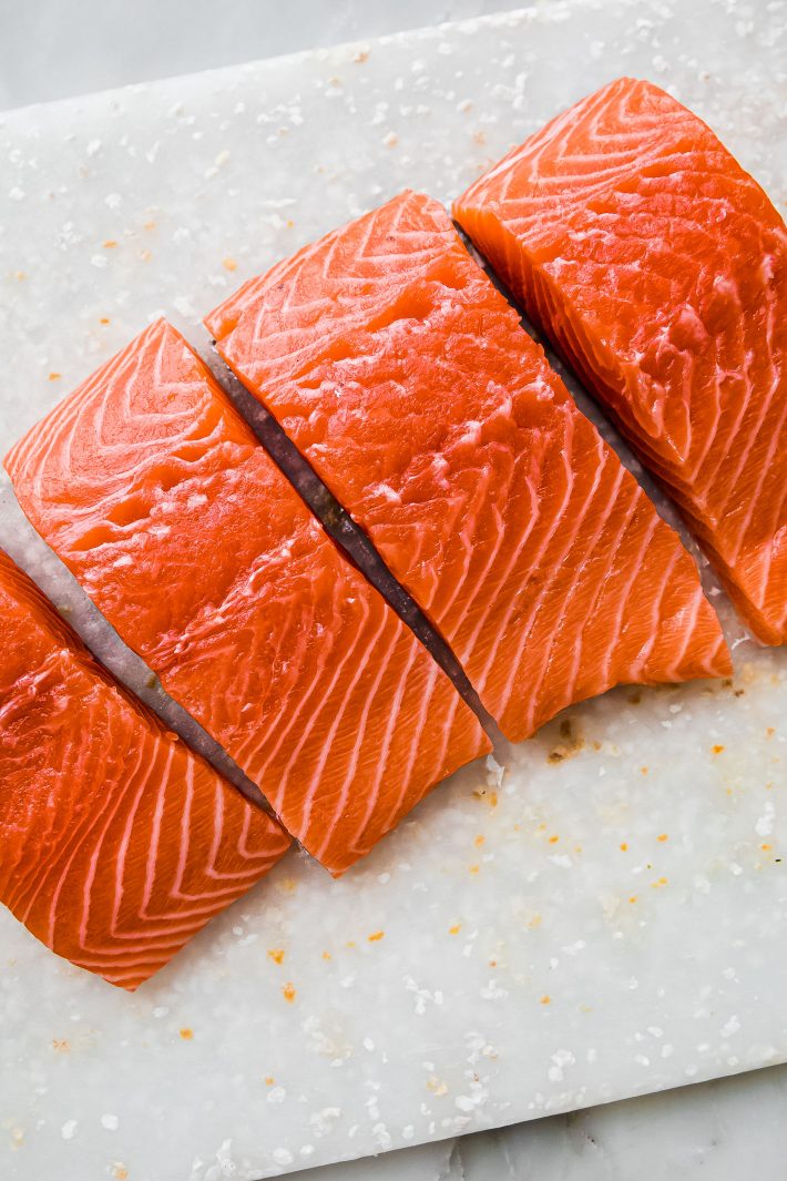 raw salmon on the cutting board