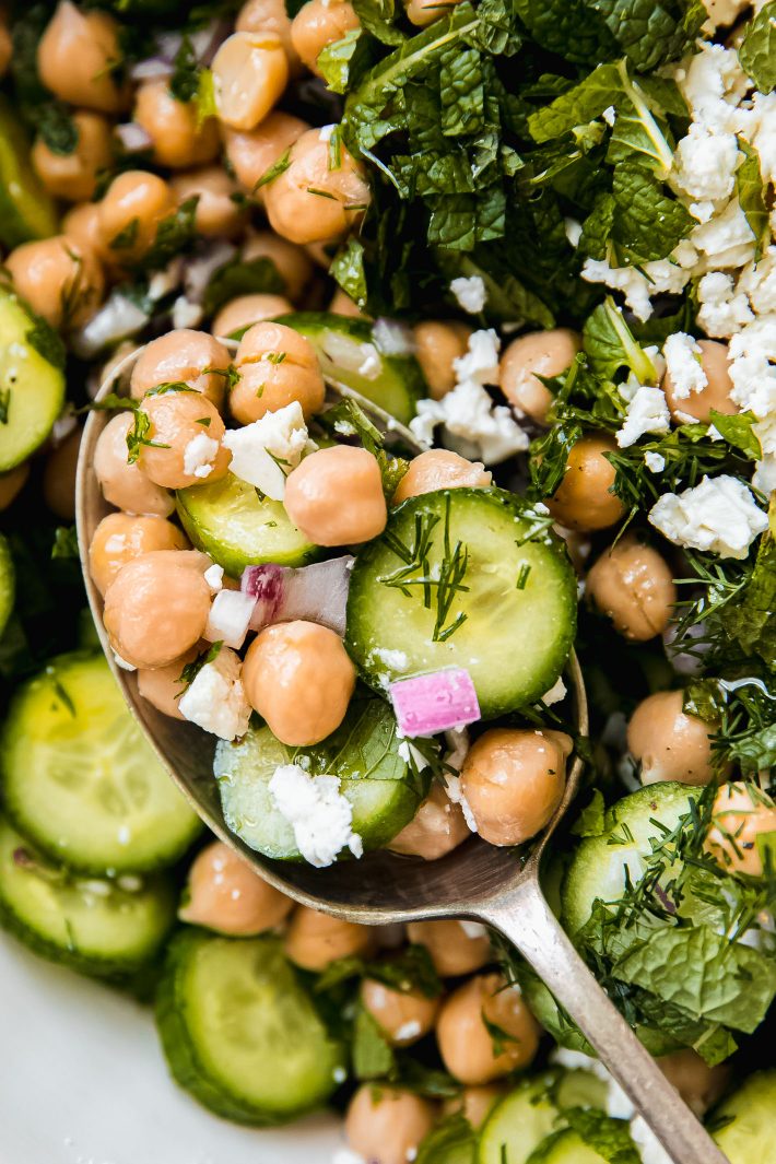 close up of dill chickpeas, feta, and cucumbers