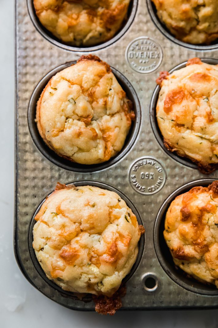 savory zucchini muffins in tin pan