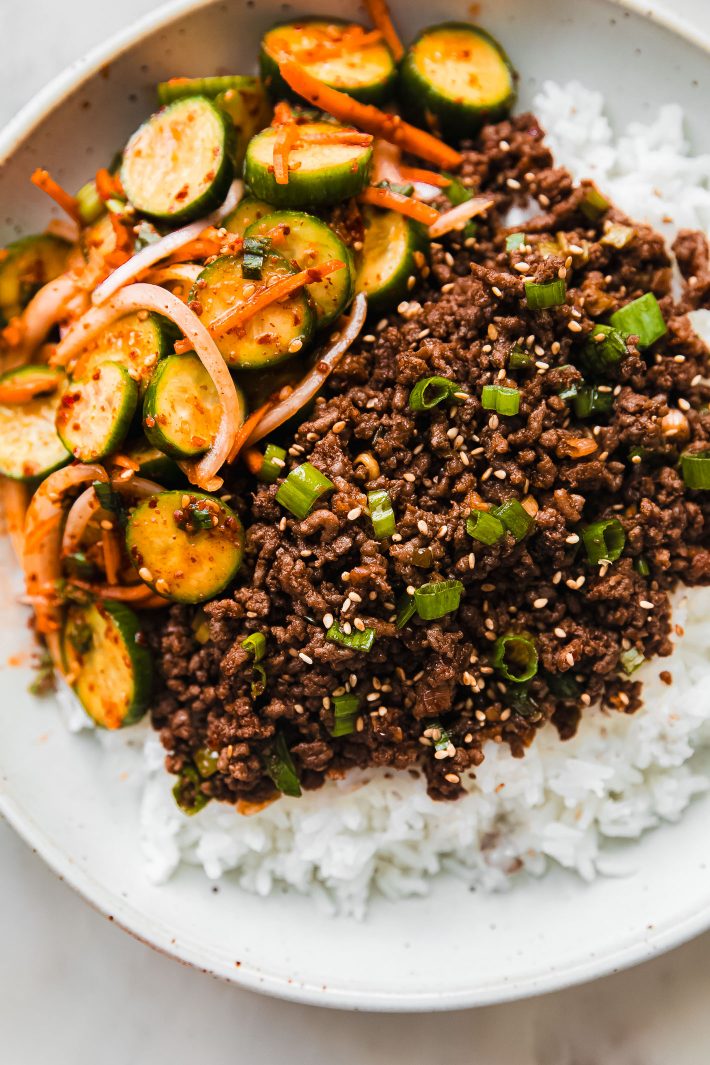 rice bowl with cucumber salad and ground beef