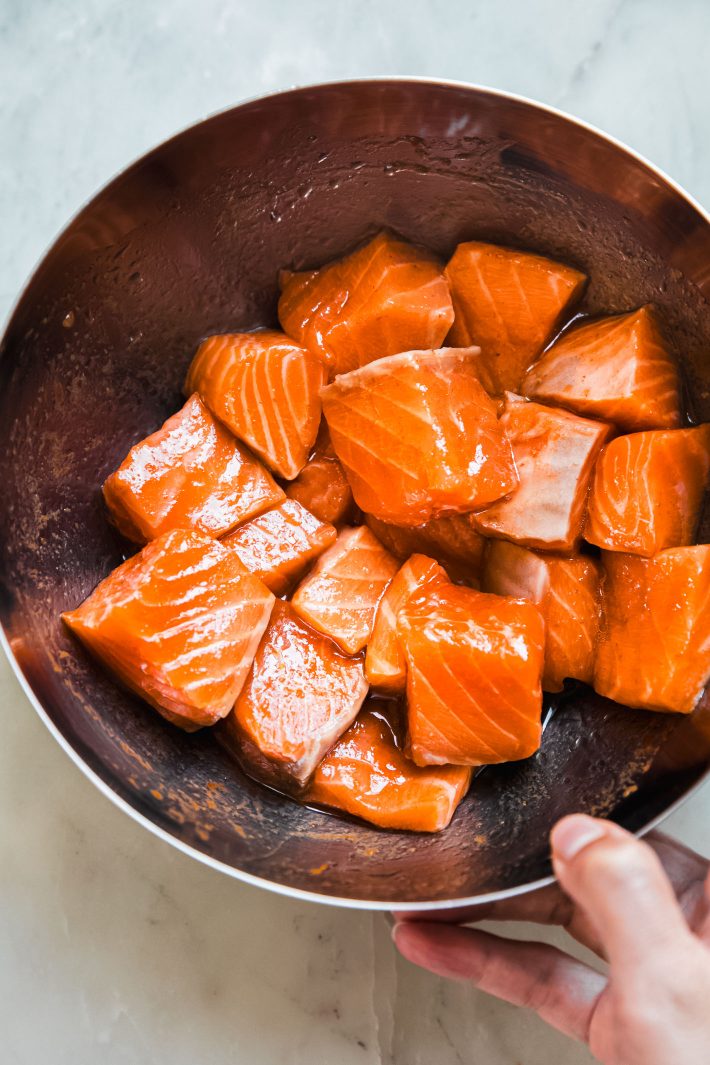 marinated salmon pieces in bowl